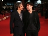 Riccardo Scamarcio and Sergio Rubini Duetto pose on the red carpet during the 6th International Rome Film Festival on October 30, 2011 in Rome, Italy.