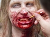 A zombie extra has her teeth detailed, "The Walking Dead" June 14, 2011