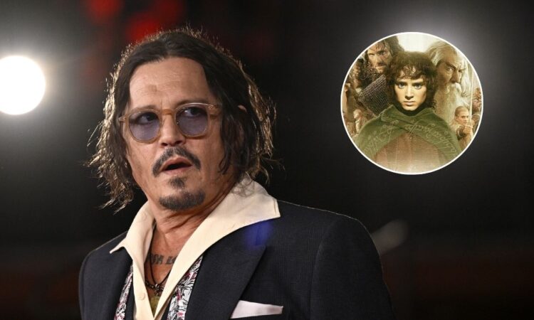 Johnny Depp Natale film Ebenezer A Christmas Carol Johnny Depp al red carpet con un’immagine de Il Signore degli Anelli sullo sfondo